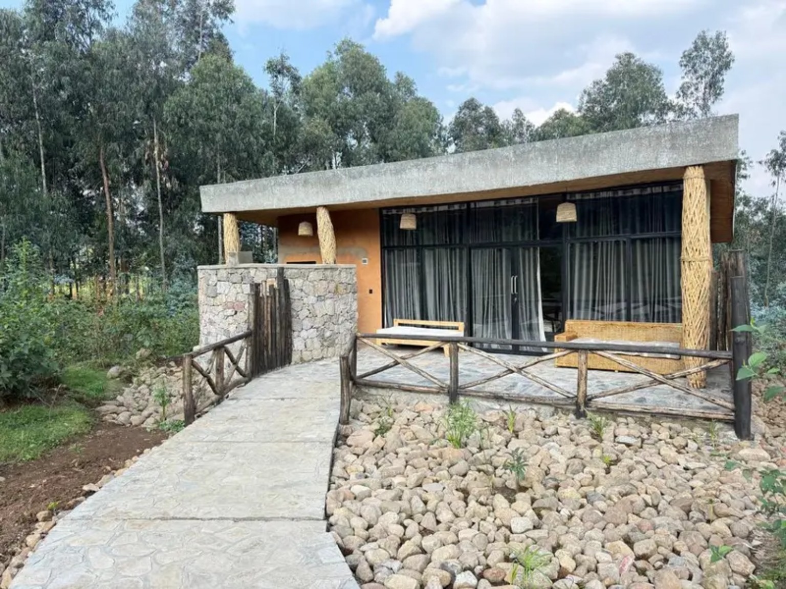 Gahinga Resort lodge exterior surrounded by trees